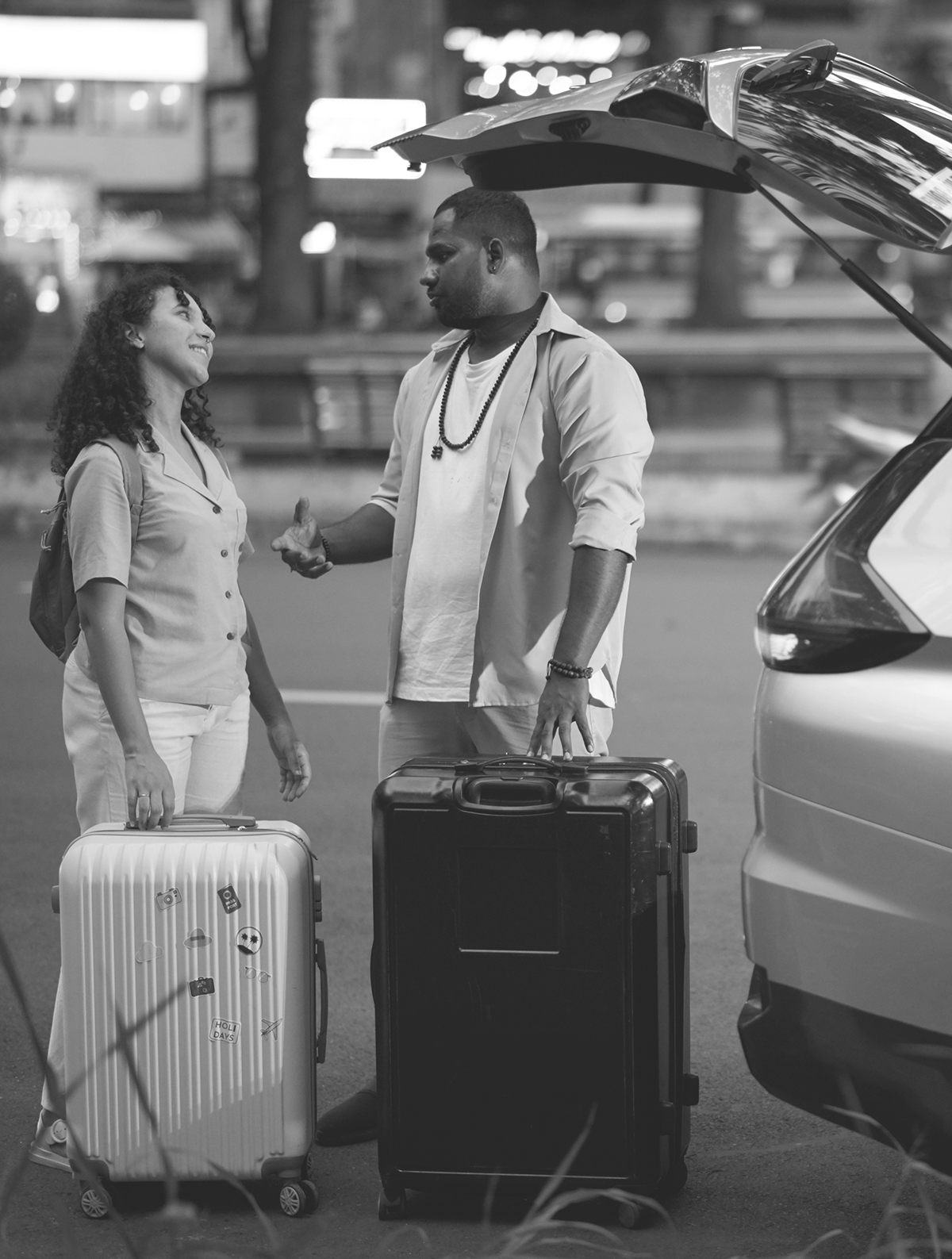young-travelers-having-chat-by-taxi-cab-2025-03-14-19-43-50-utc